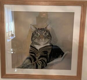 Framed tabby cat portrait
